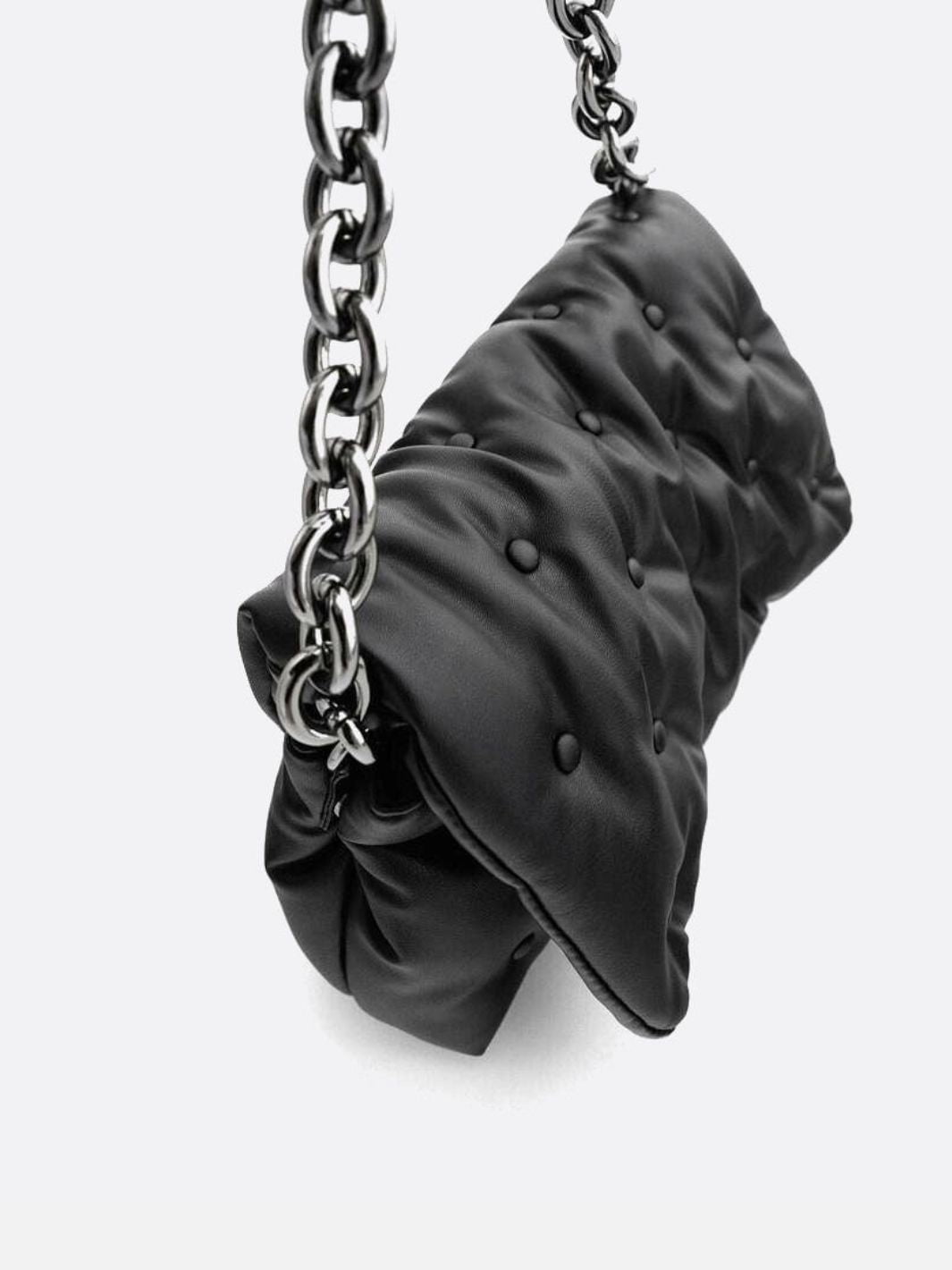 Black quilted bag with chain shoulder strap